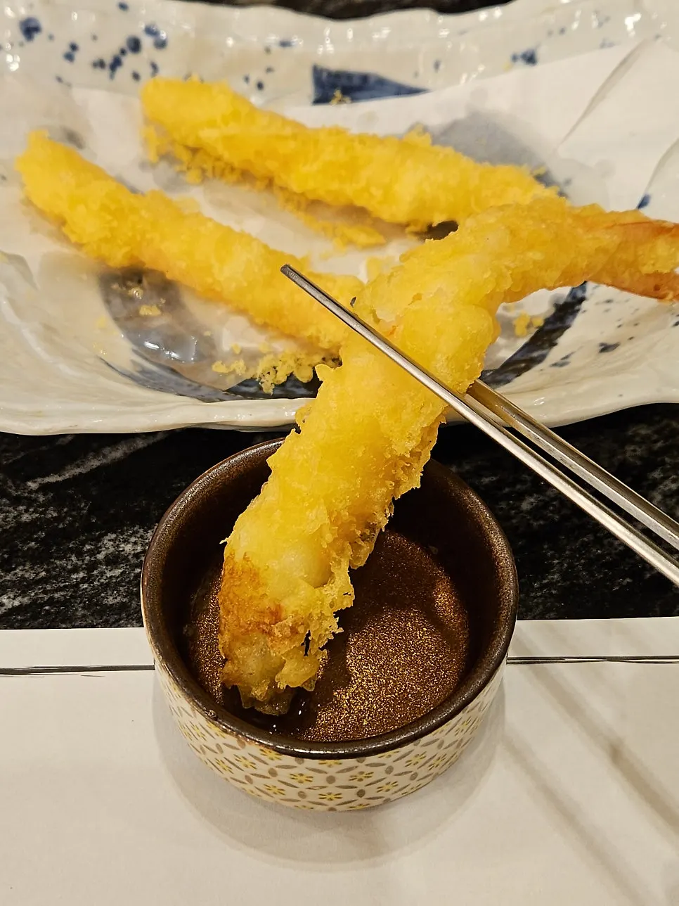 Cross-section of crispy-battered shrimp tempura