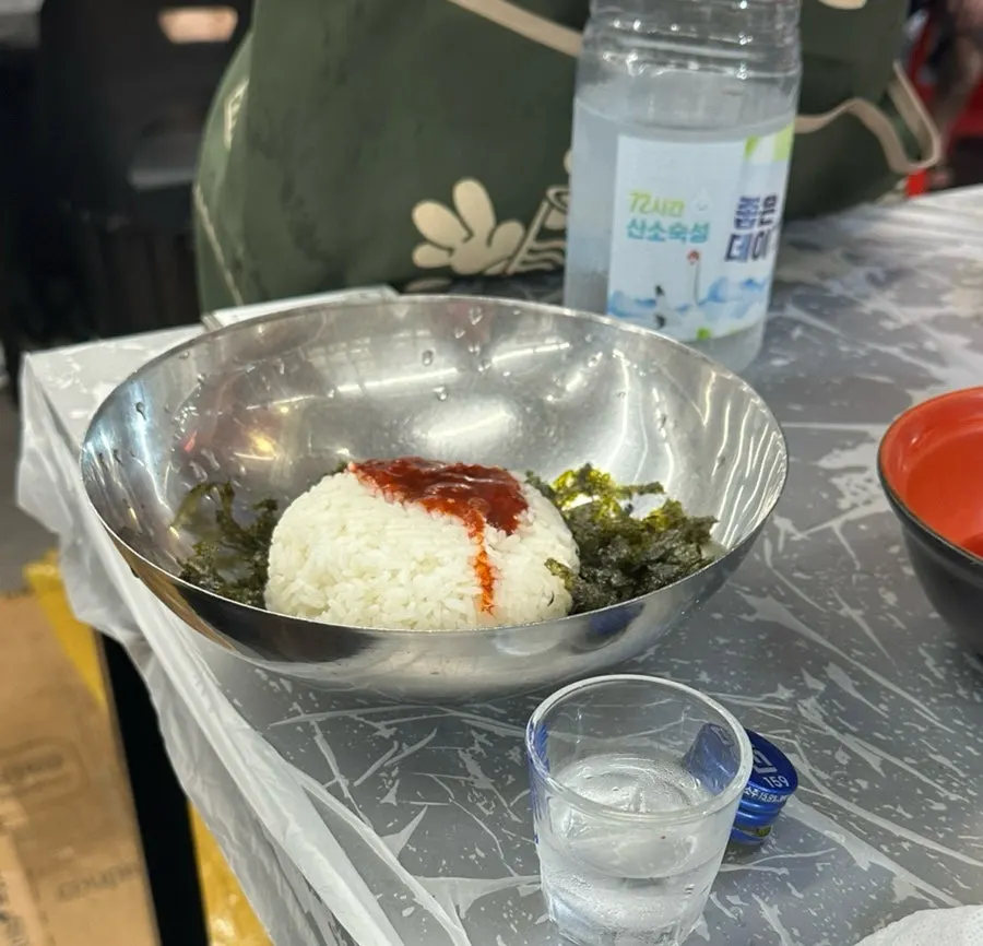 A Bupyeong Yang Gopchang meal with information about walk-in reservations