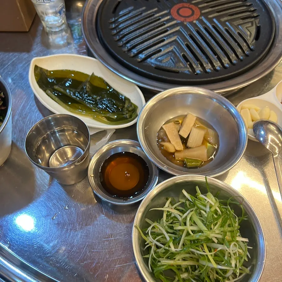 Salted pollock roe and wild garlic leaves among the side dishes