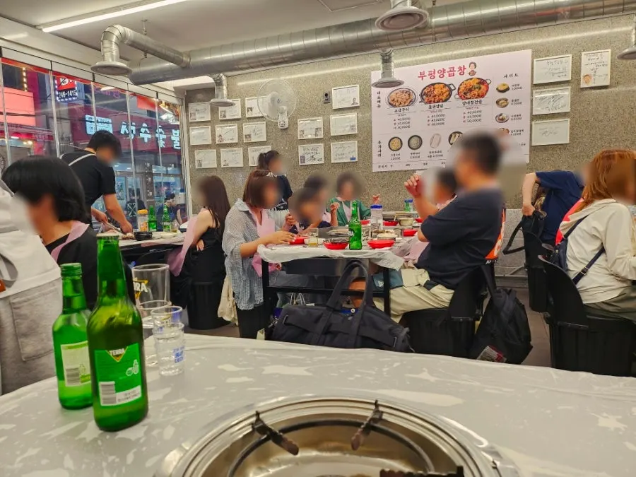Indoor seating at Bupyeong Yang Gopchang on a Monday evening