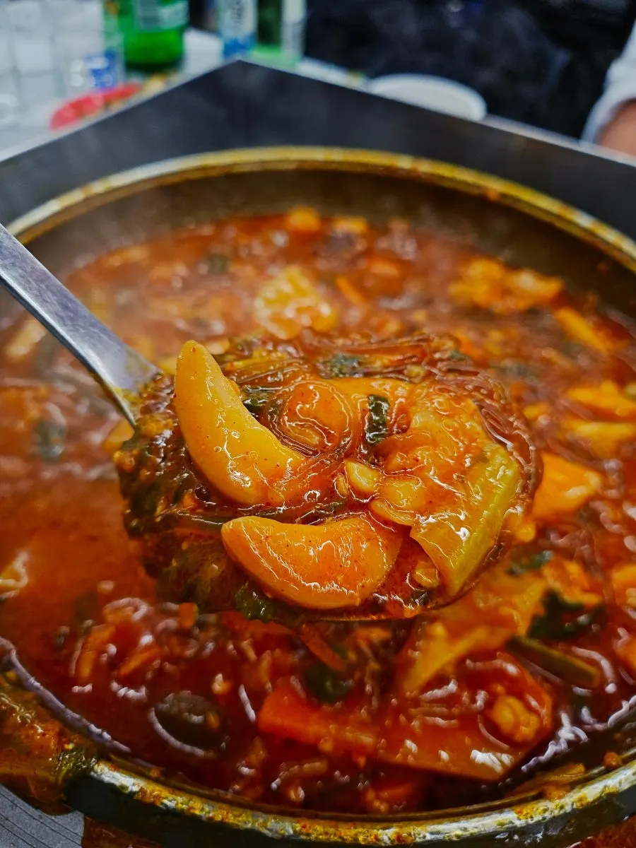 Gopchang hotpot broth simmering