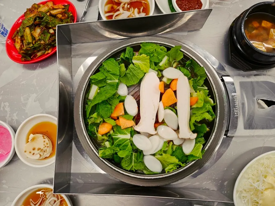Gopchang hotpot paired with a shot of soju