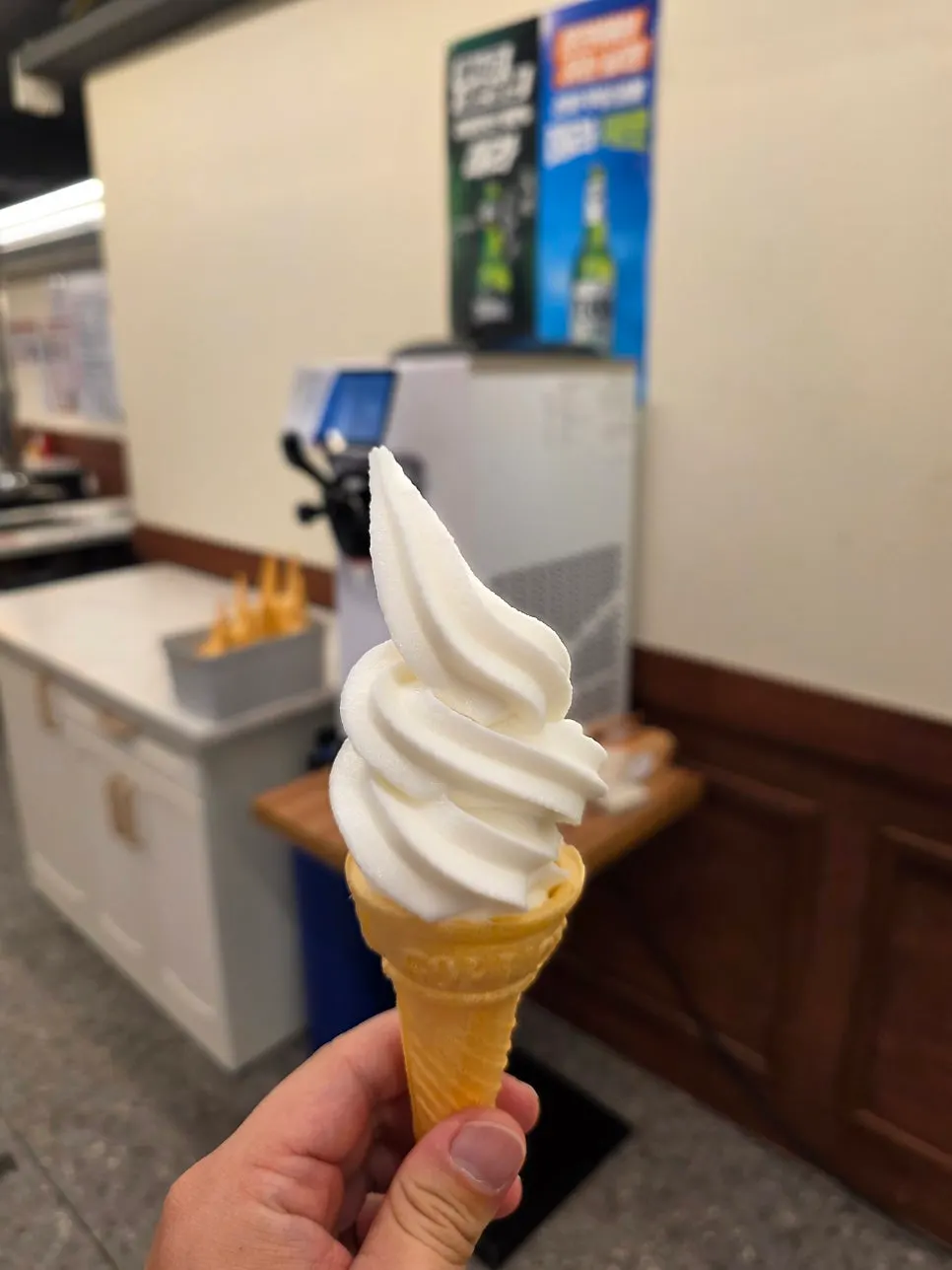 Self-dispensed soft-serve ice cream cone