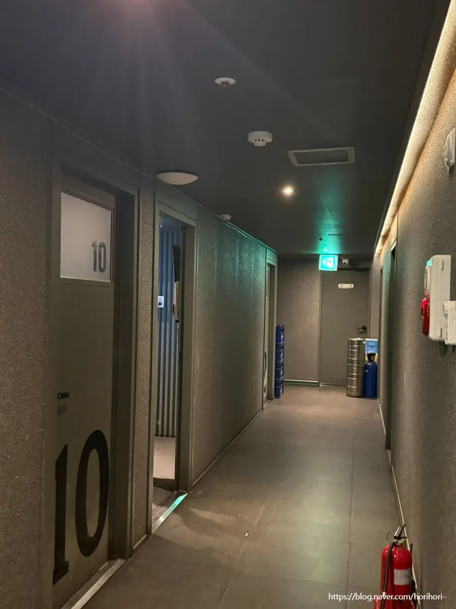 Interior corridor lined with rooms