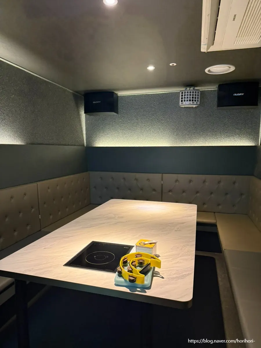 Spacious room lit with indirect lighting