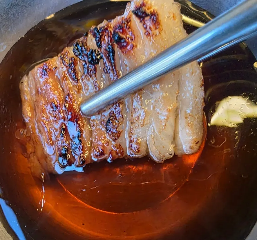 Seasoned pork ribs fully grilled on the grill