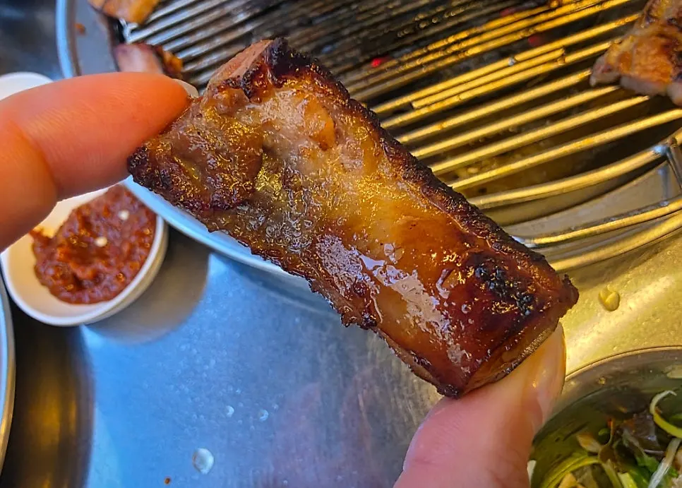 Bibim noodles served together with pork ribs