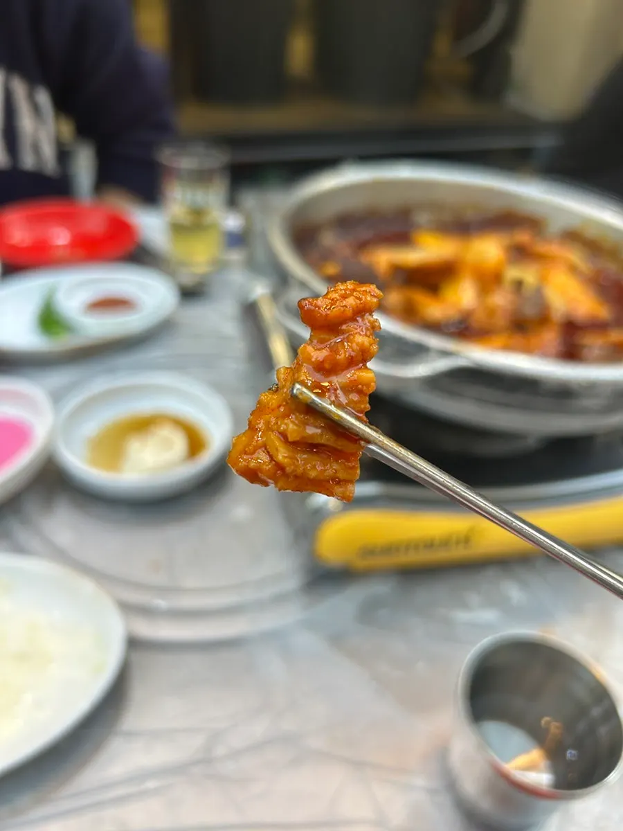 A tender piece of well-cooked daechang