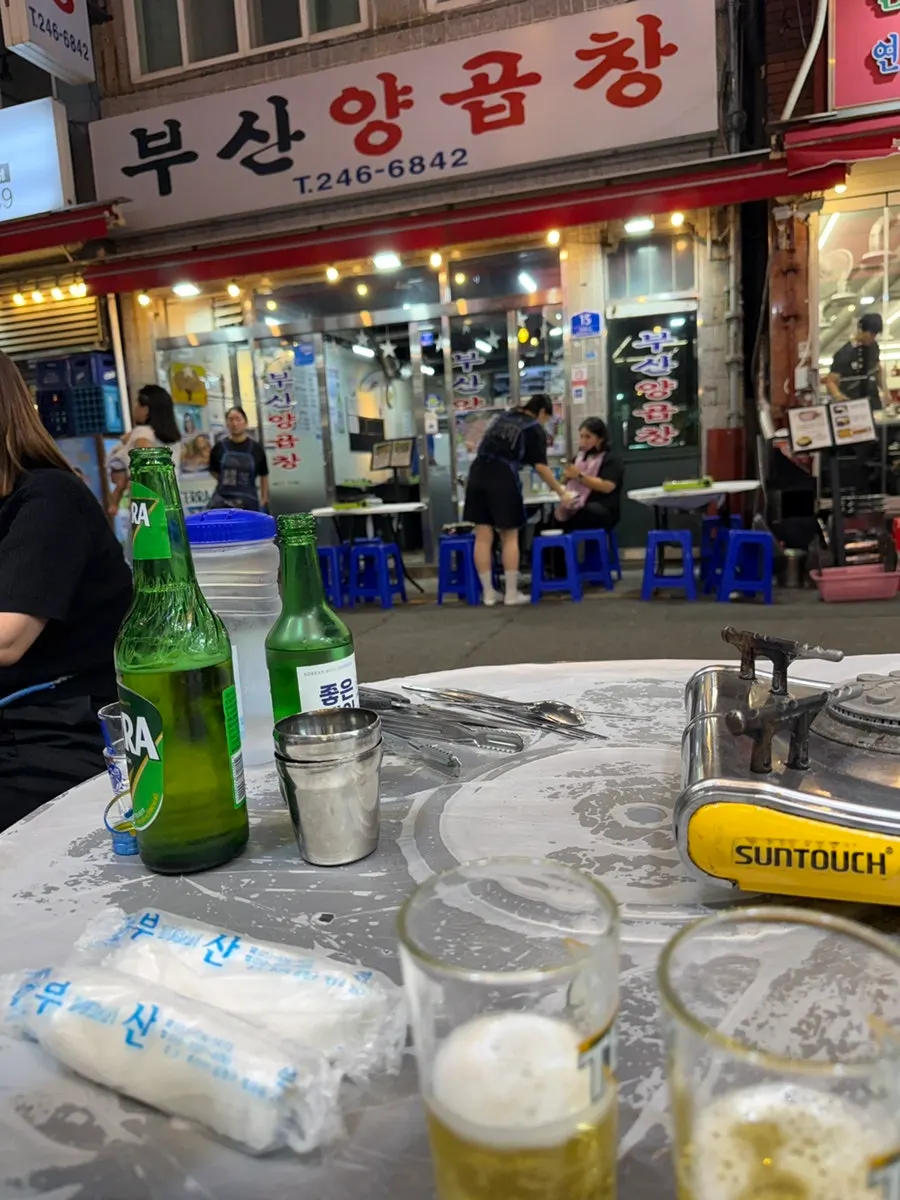 Customers seated at outdoor tables