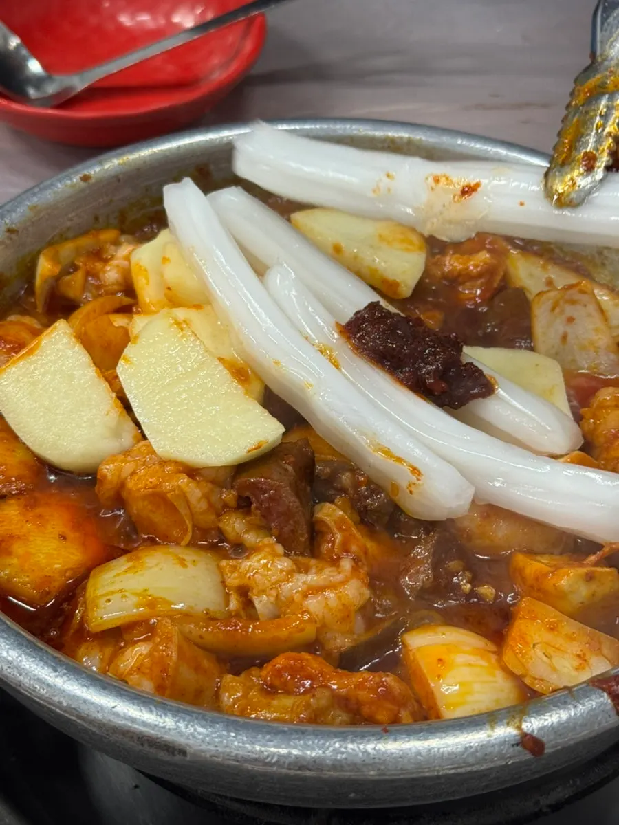 Yang gopchang on the stone pan, prepped by staff