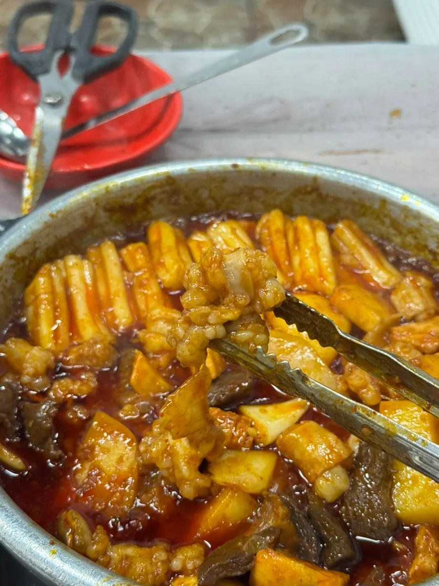 Potato sari soaked in sauce