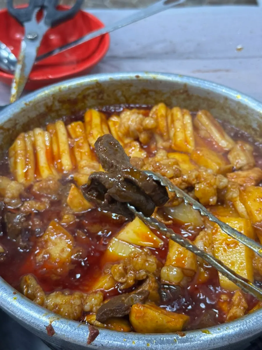 A piece of chewy bunmoja with yang gopchang