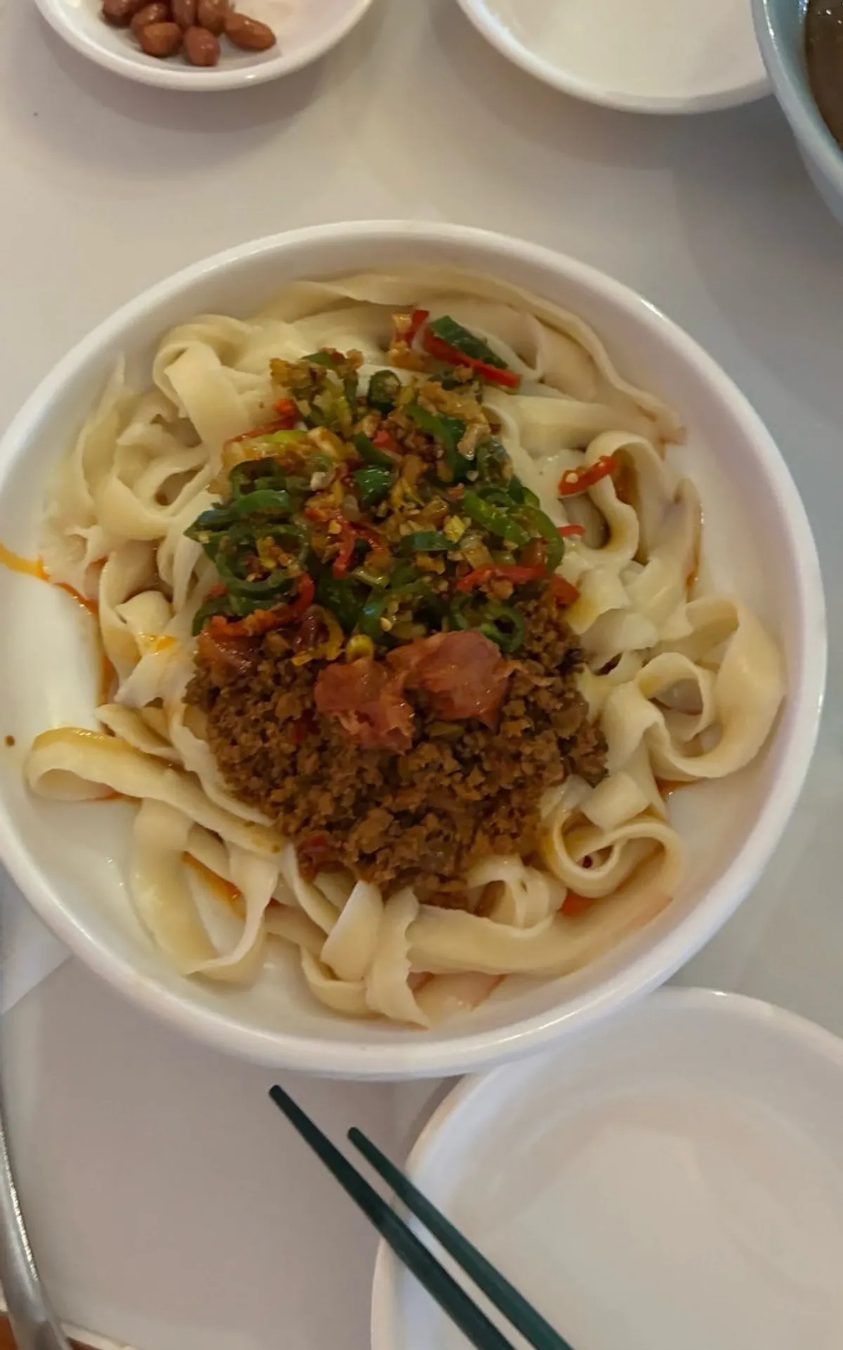 Two bowls of dosakmyeon set on the table