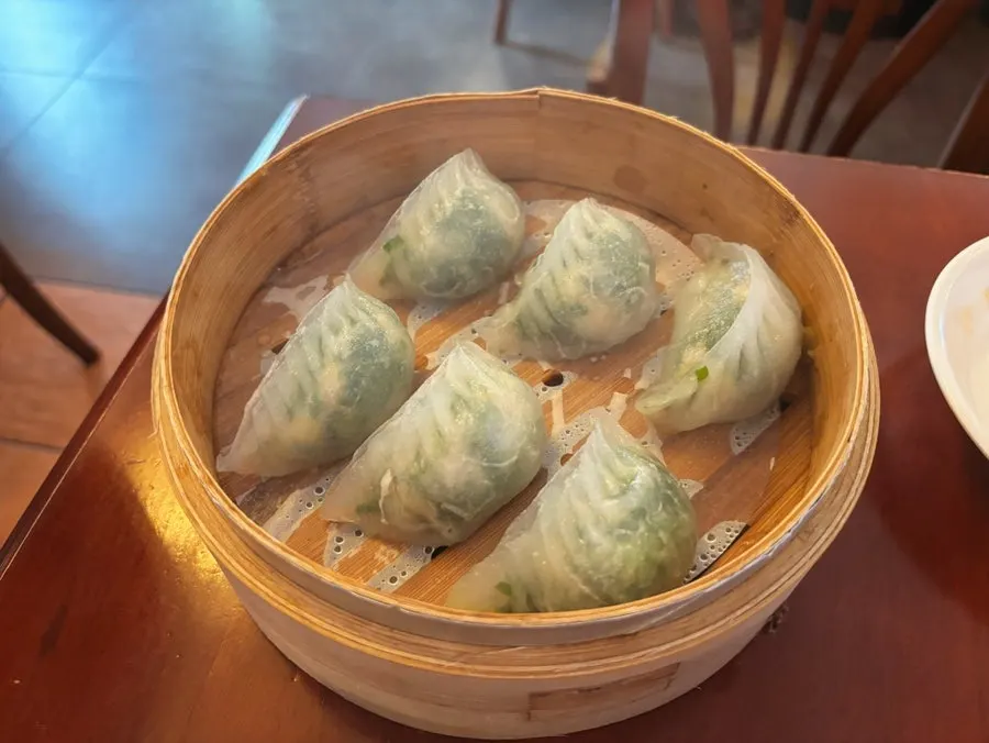 Knife-cut noodles lifted with chopsticks