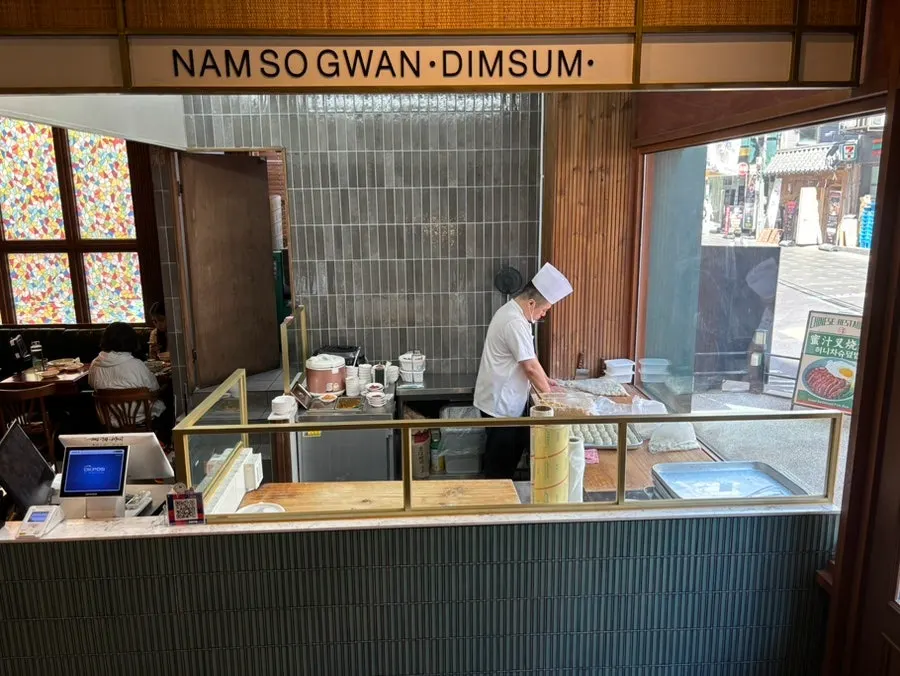 Handmade dim sum being folded in-house