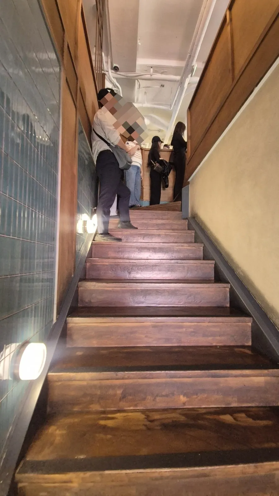 Staircase to the second floor decorated with vintage details