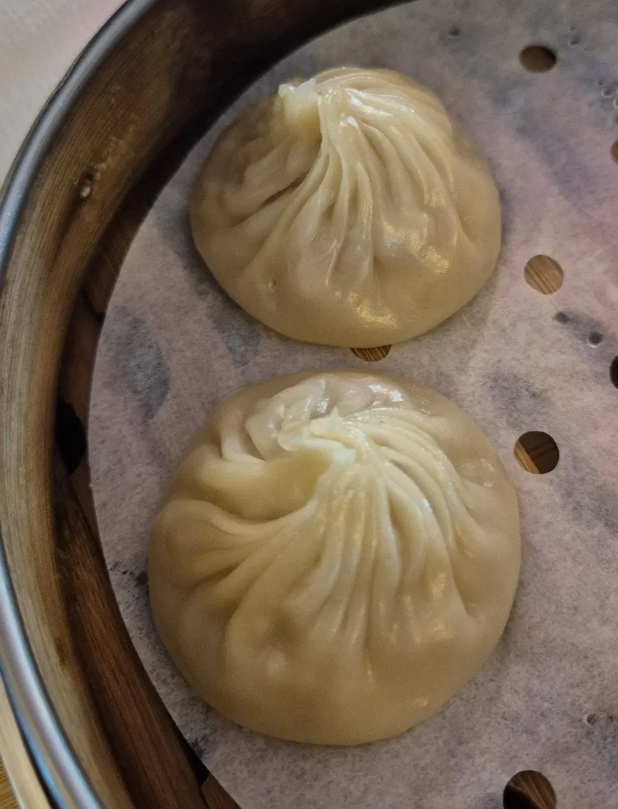 Close-up of the steaming xiaolongbao basket