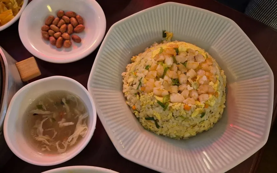 Dome-shaped shrimp fried rice topped with cocktail shrimp