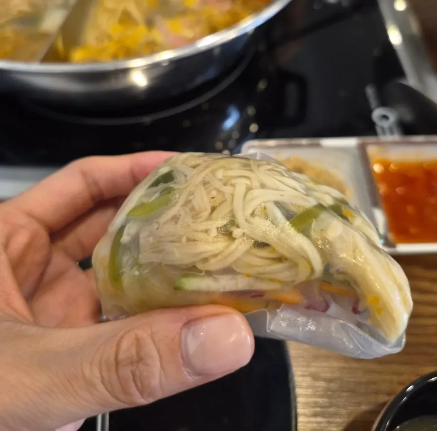Finishing shabu-shabu and Vietnamese wraps