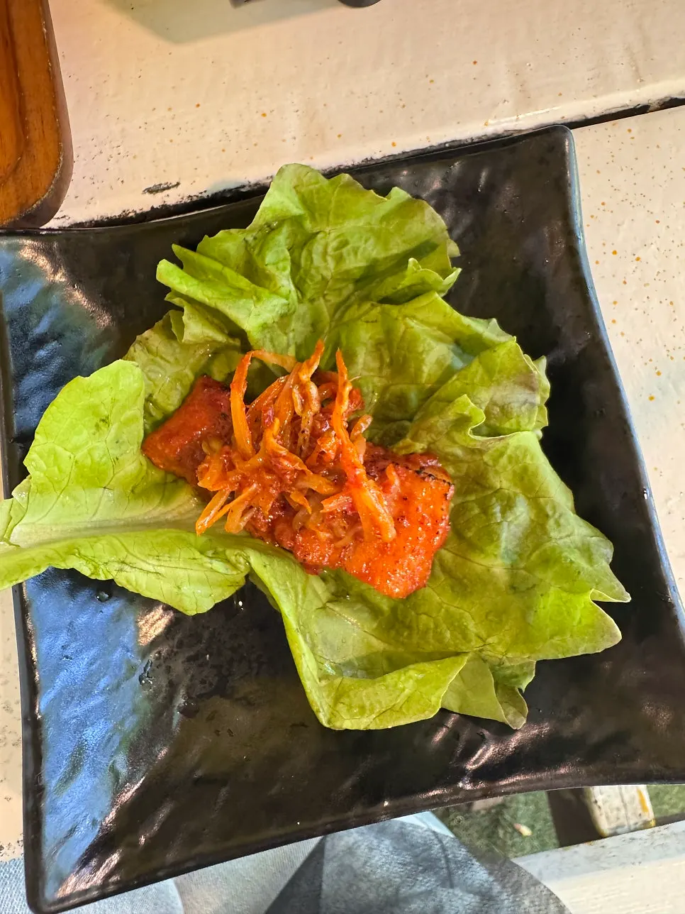 Tomato-jang pork belly eaten with a bowl of rice