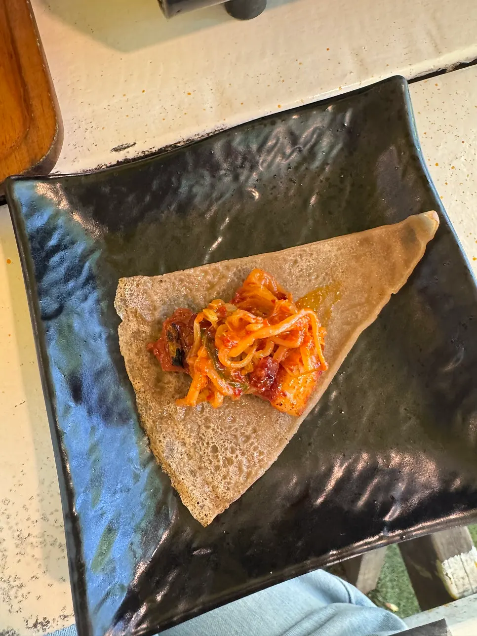 Tomato-jang pork belly wrapped in lettuce