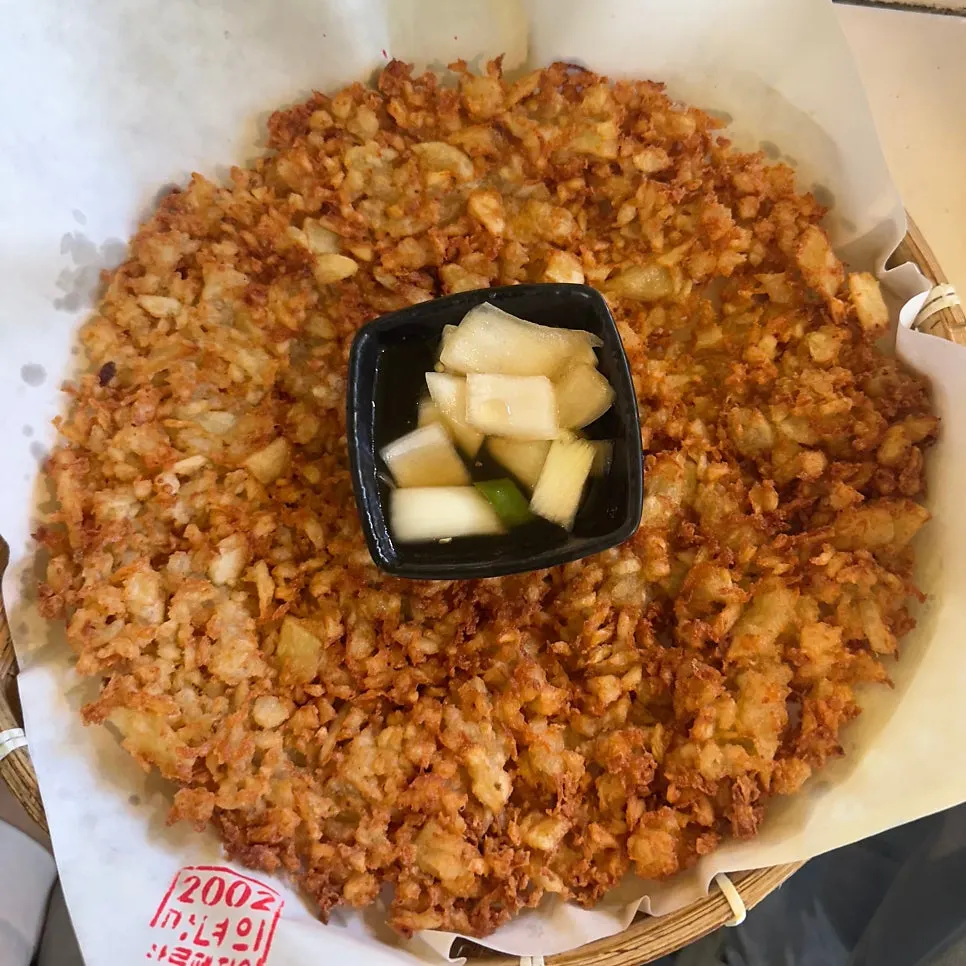 Large, thick potato pancake, crispy outside and chewy inside