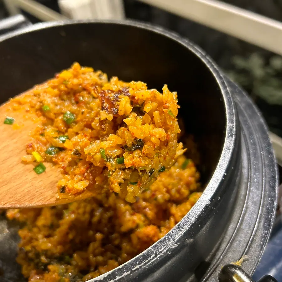A bowl full of myeongnan nurungji fried rice