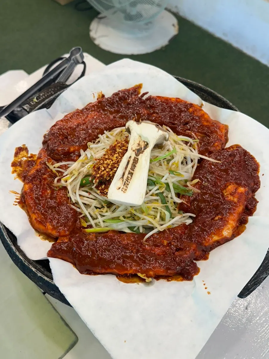 Generously set table of tomato-sauce pork belly