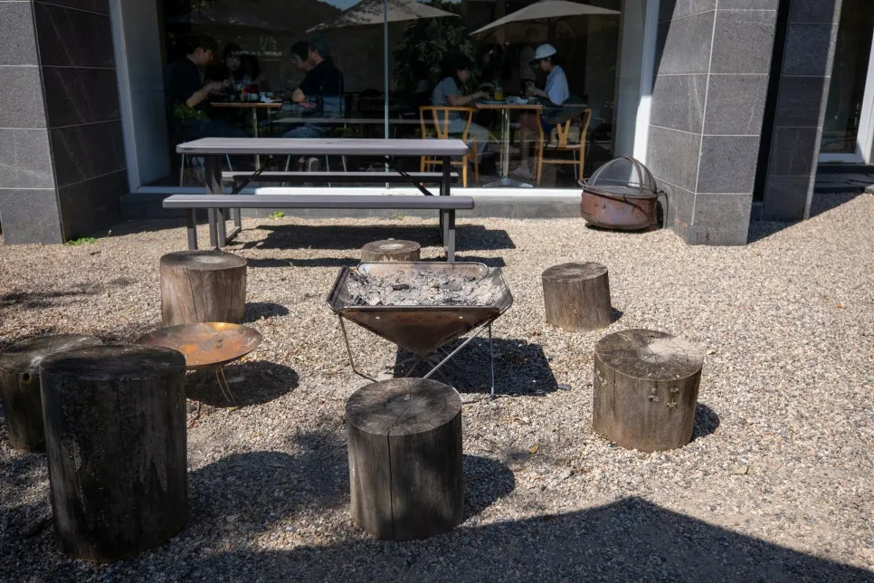 MR's outdoor terrace seats facing the Bukhan River