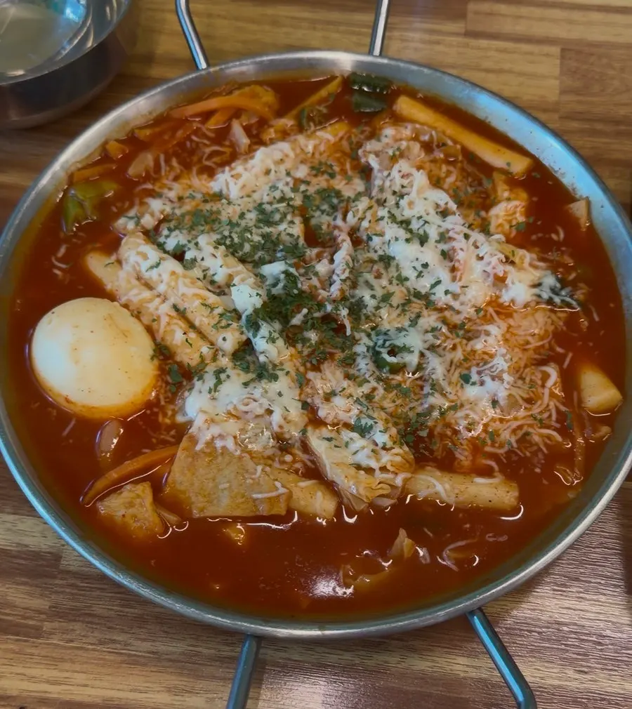 Close-up of a bowl of soupy tteokbokki