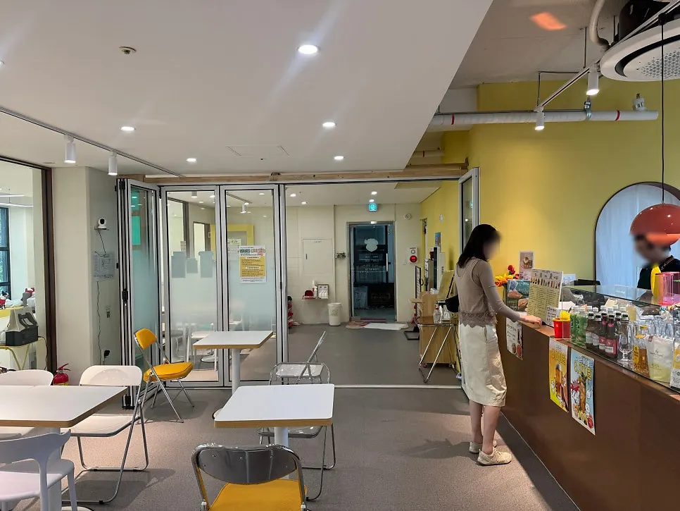 Interior of the dog café made open with full glass walls