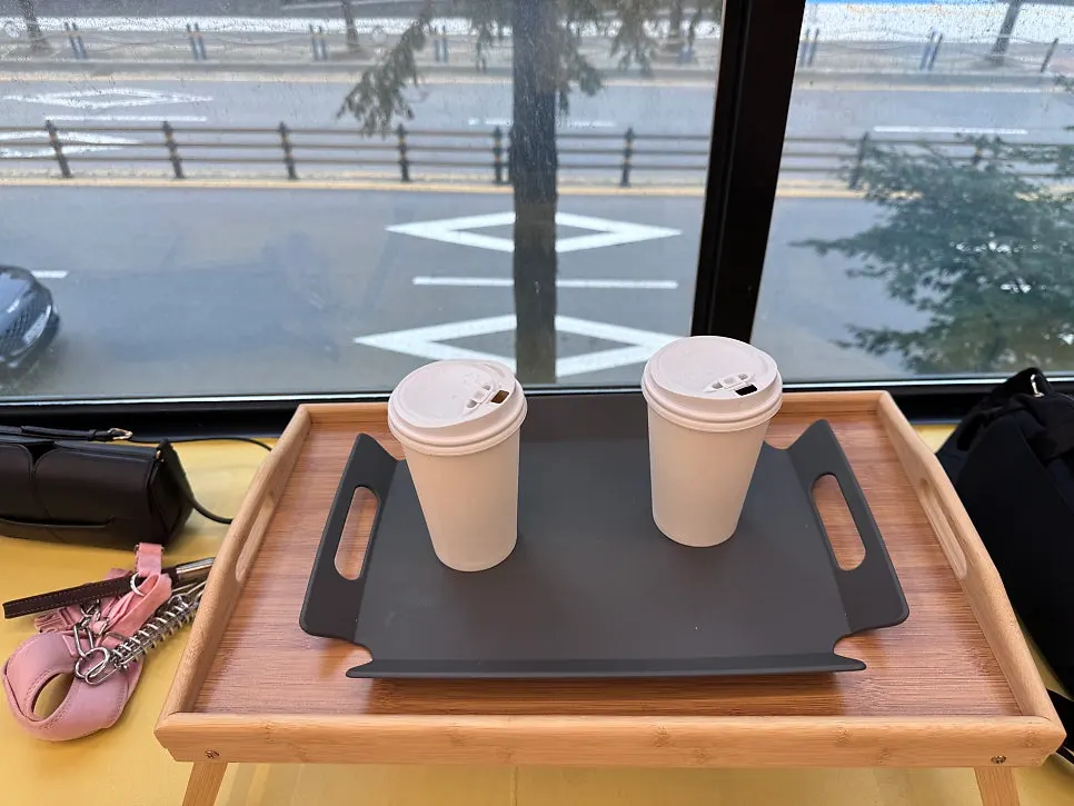 Warm drink with an ice-cream-topped waffle