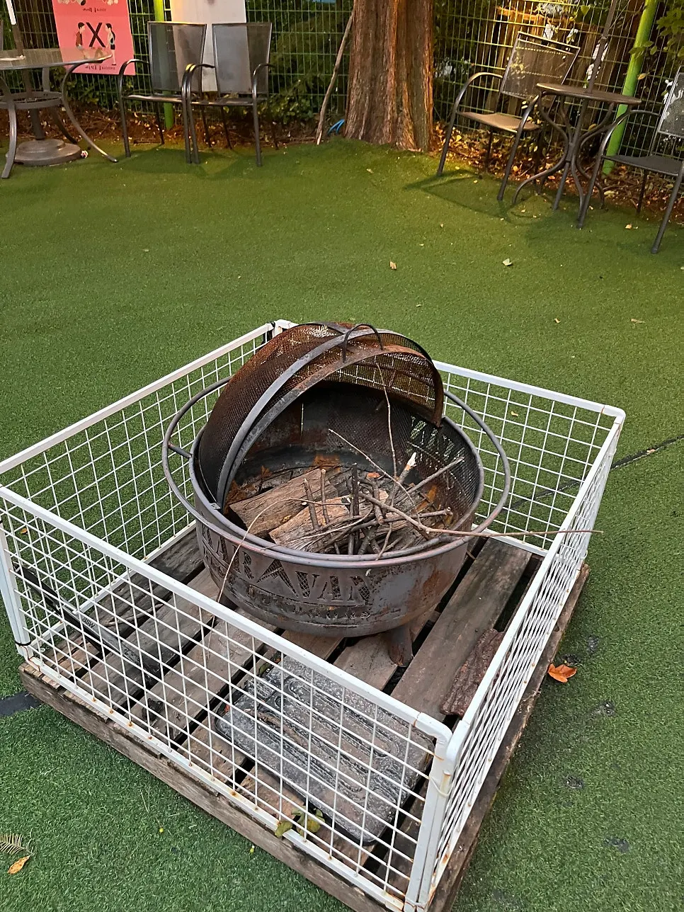 Indoor play area with a wood-burning stove