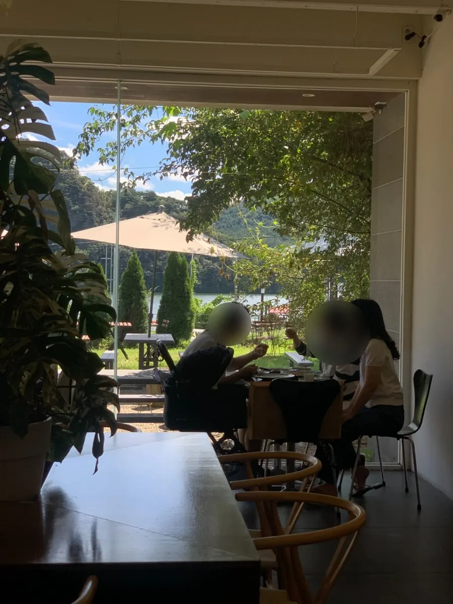 Main building seating with river view through the window