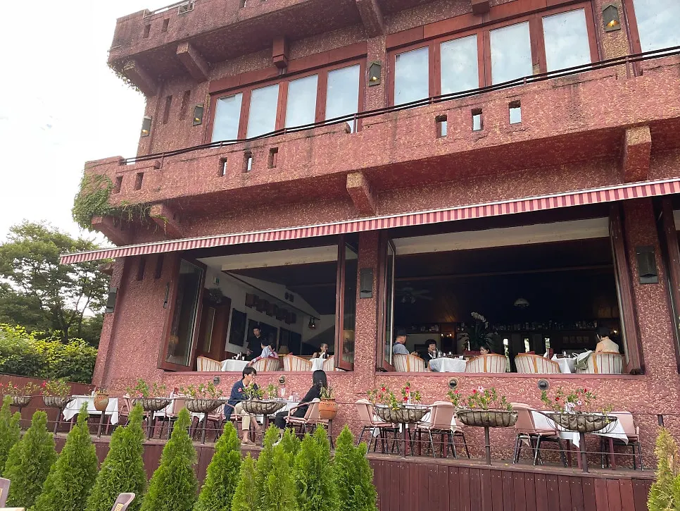Outdoor seating overlooking the Bukhangang River