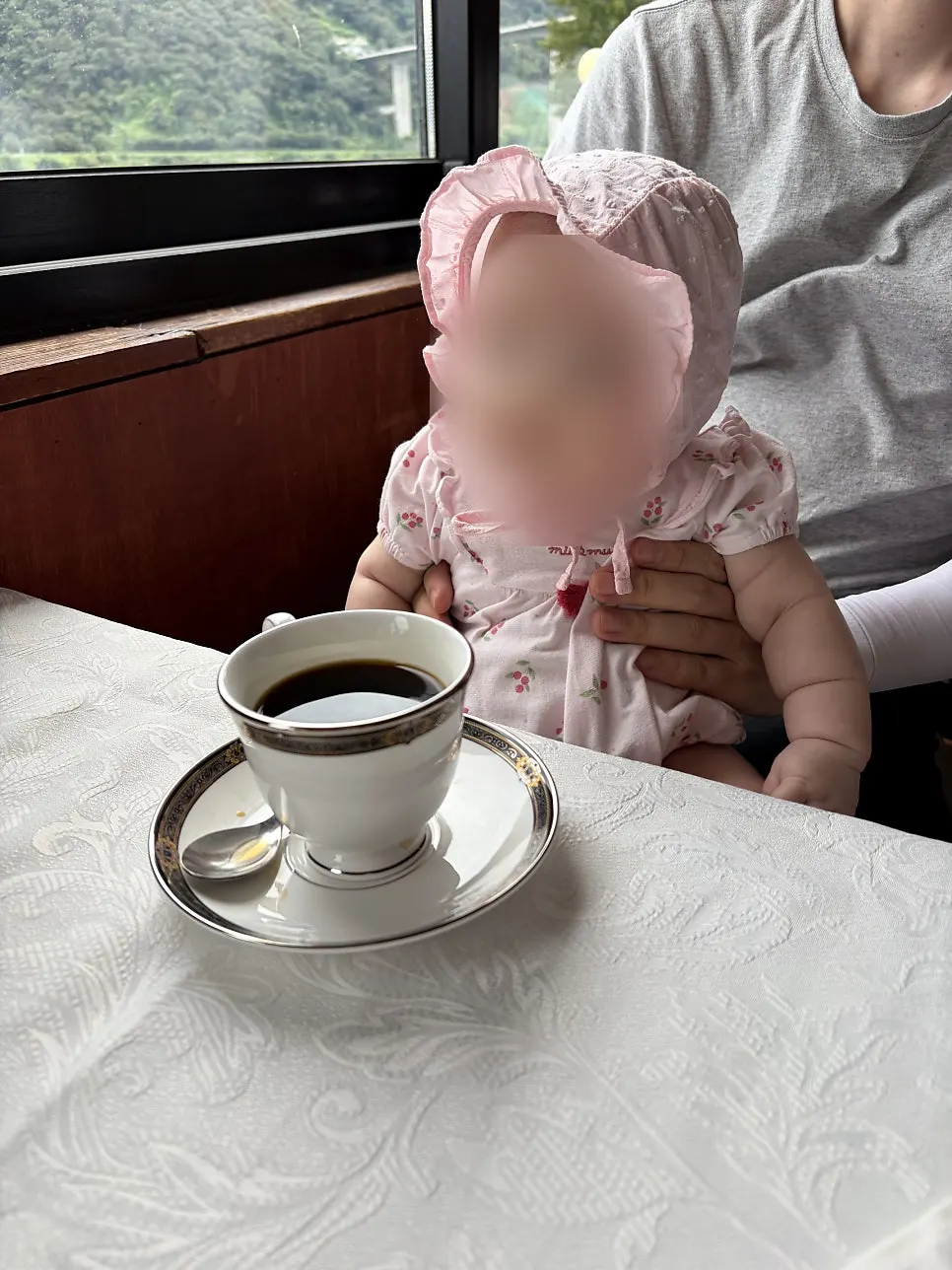 Enjoying dessert at a window seat