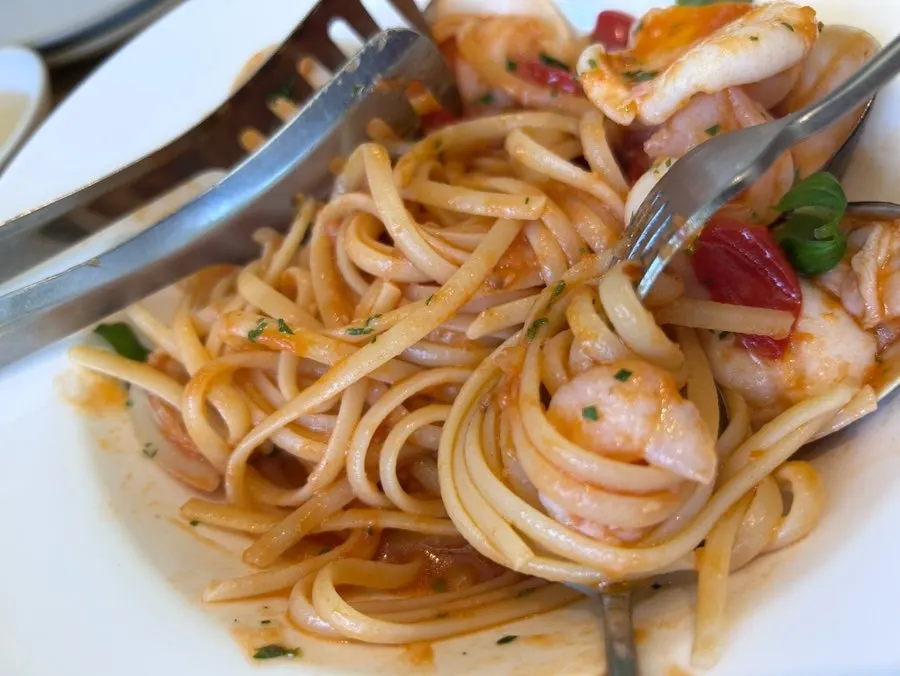 Plate of tomato-sauce seafood pasta