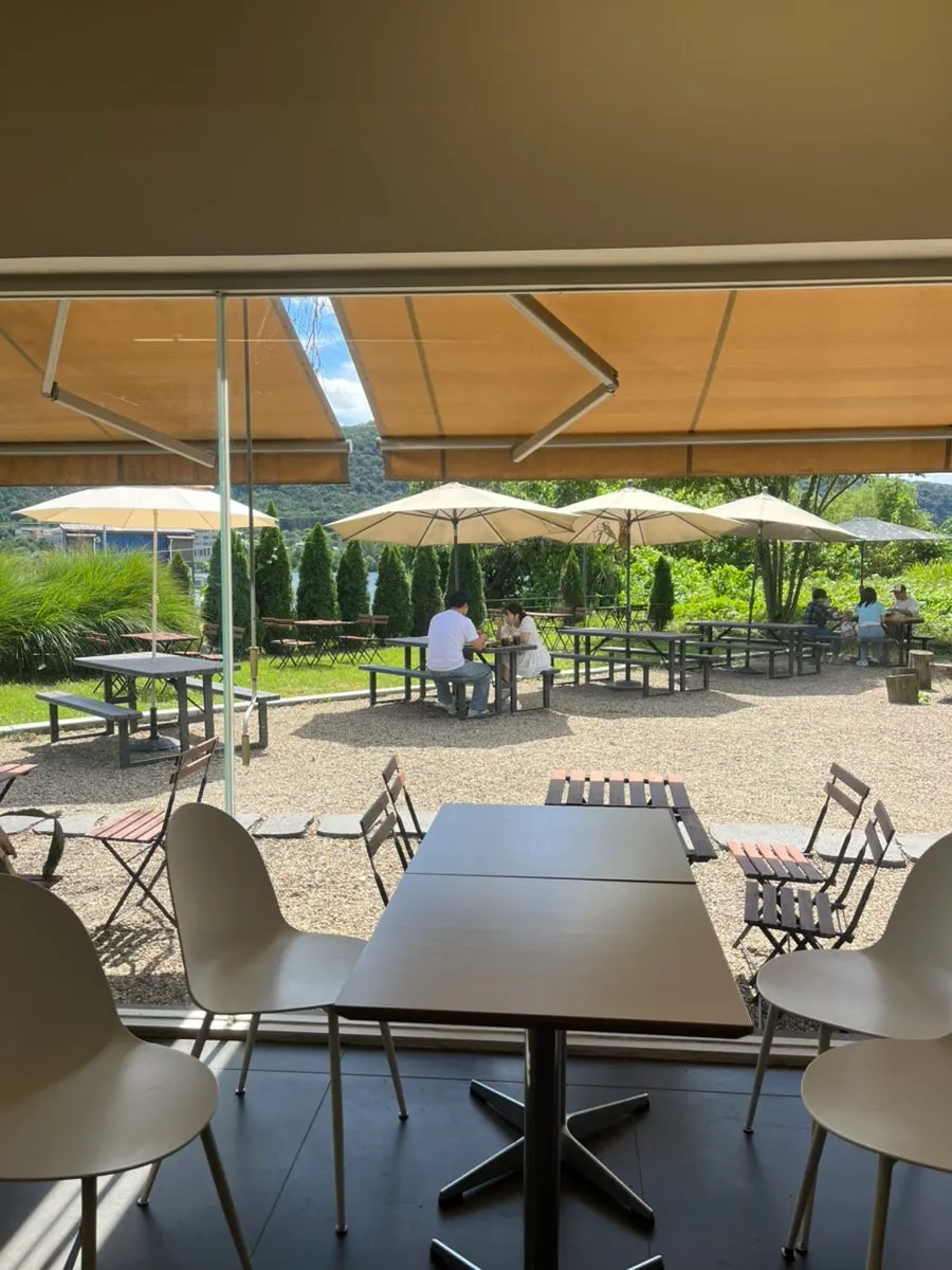 Outdoor seating for enjoying the Bukhangang River breeze