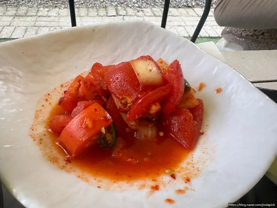 Tomato salad served as a side dish