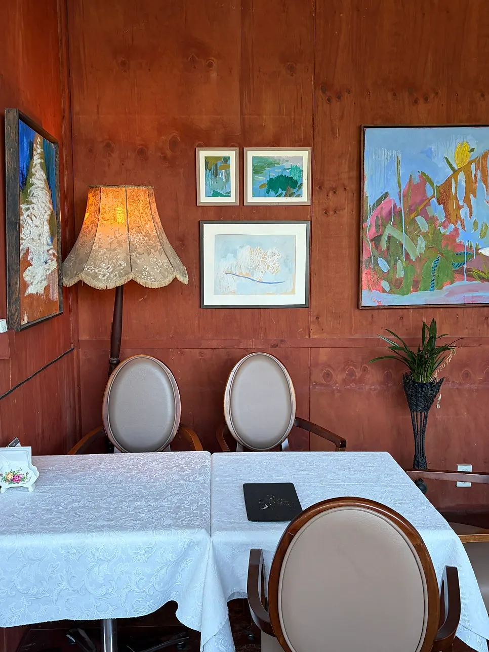 Indoor seating with a view of the Bukhangang River