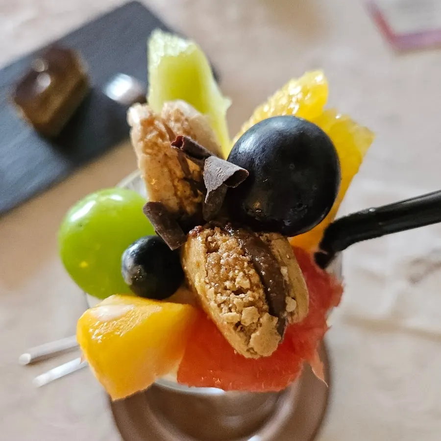 Eony & Chevalier topped with fresh fruit and macarons