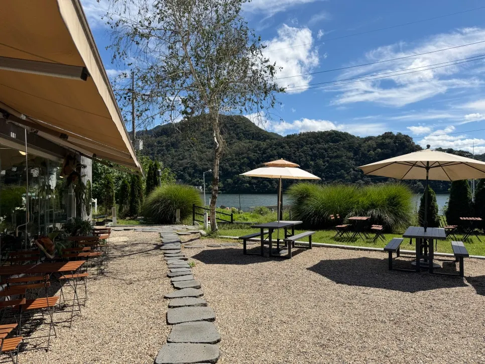 View of the river and mountains from a shaded parasol seat