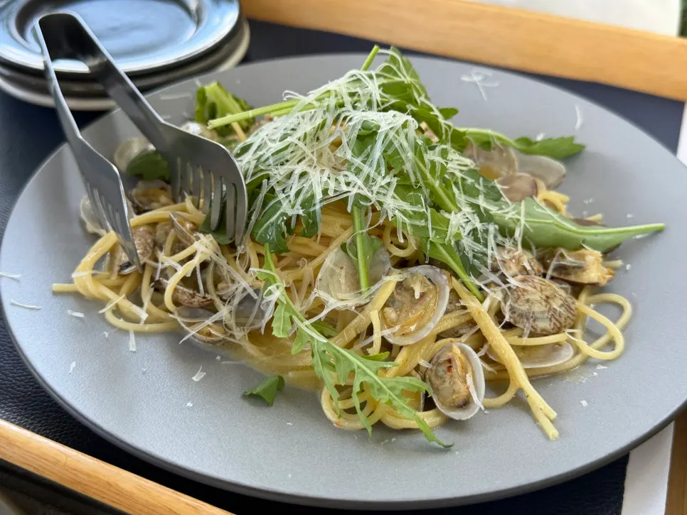 Bongolre pasta loaded with clams