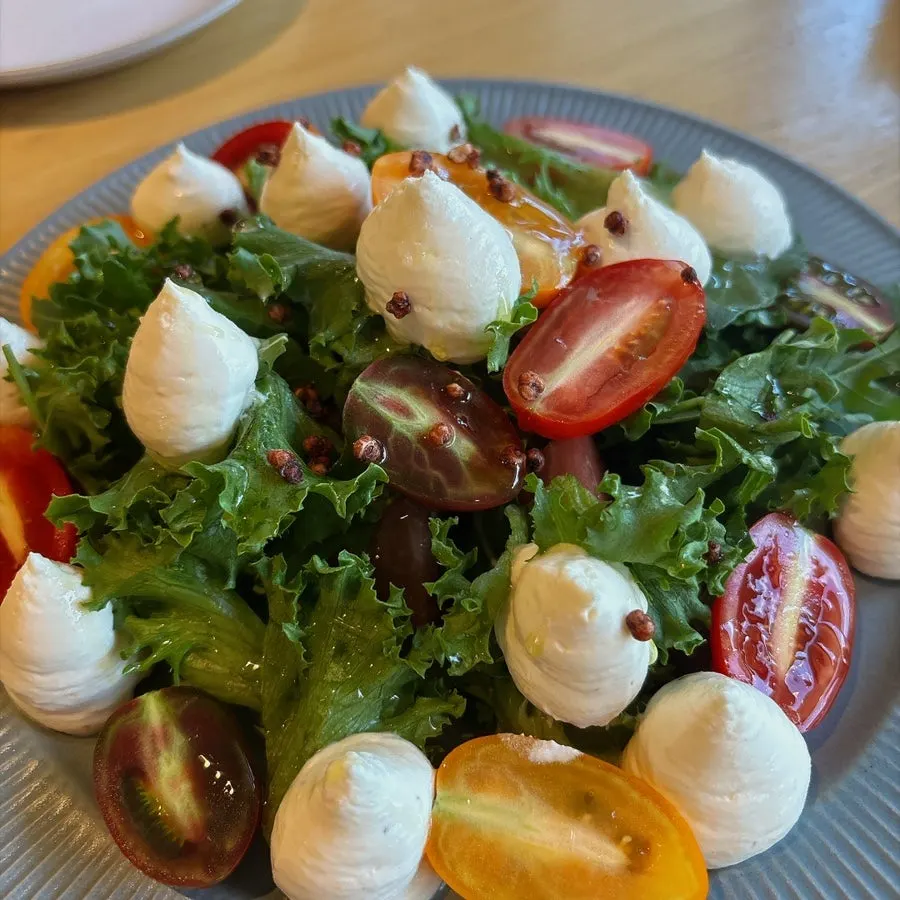 Pine nut caprese salad with ricotta cheese