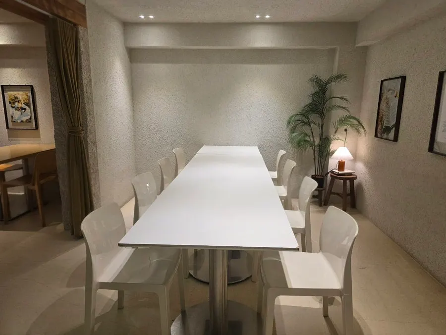 White long table seating multiple people