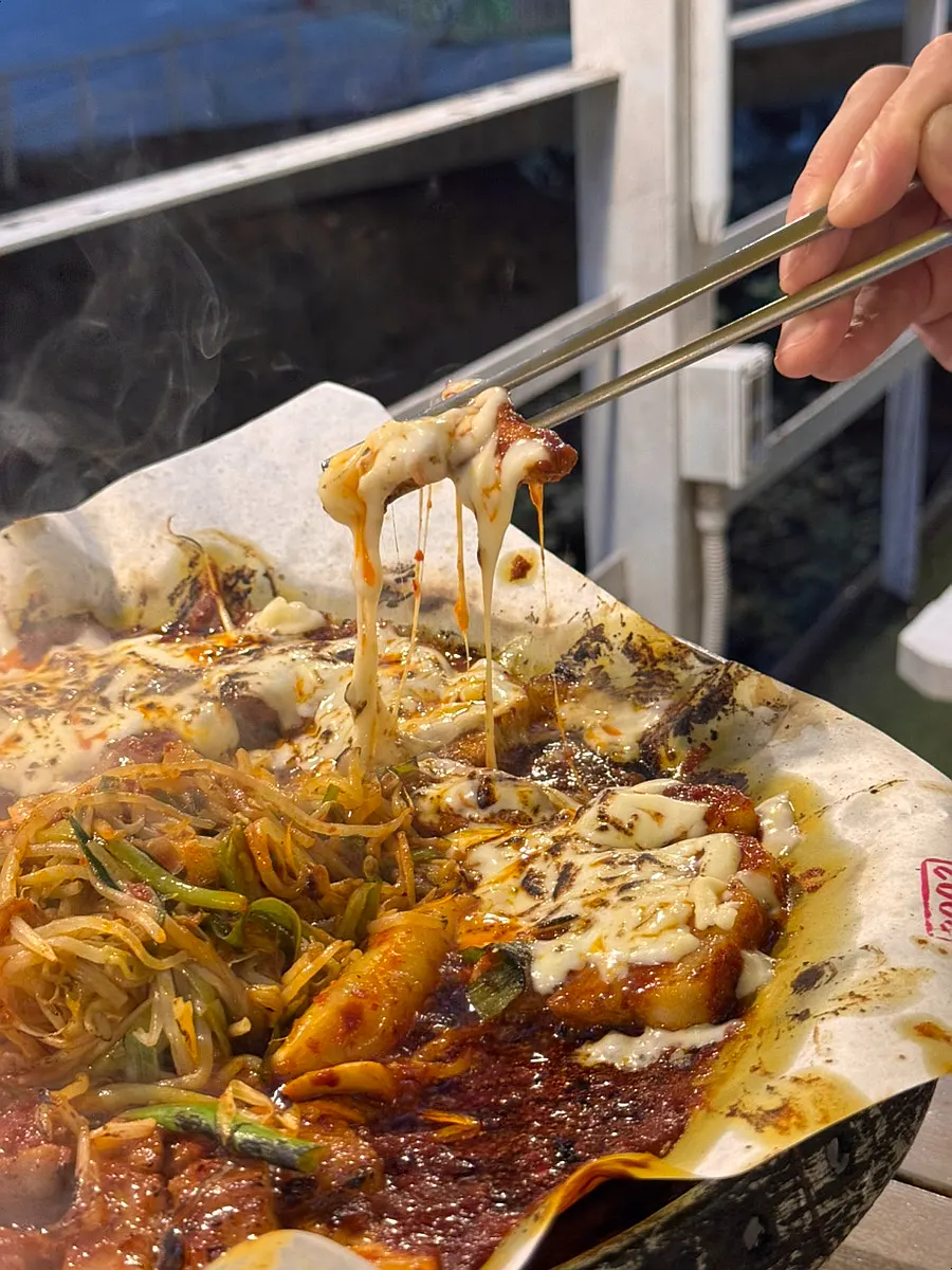 Melted cheese on the cheese pork belly