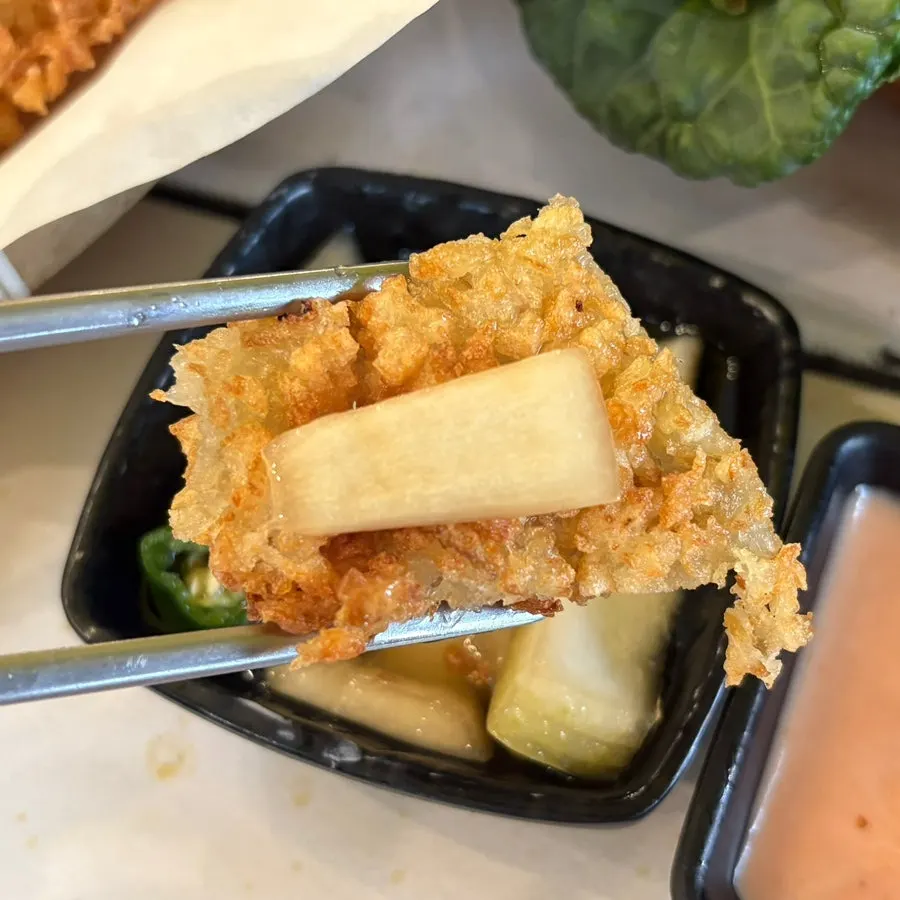 Cross-section of the potato pancake with side dishes