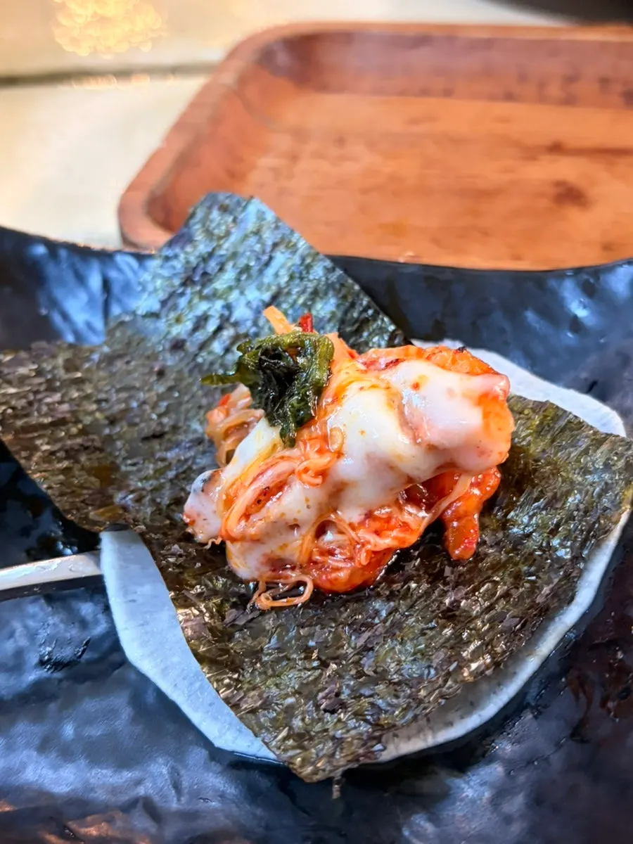 Pork belly wrapped in gim and pickled radish