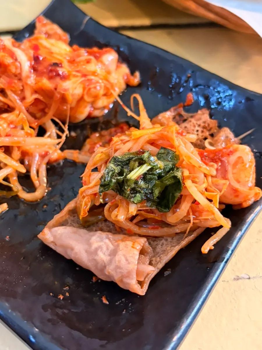 A wrap of pork belly in an acorn buckwheat crepe