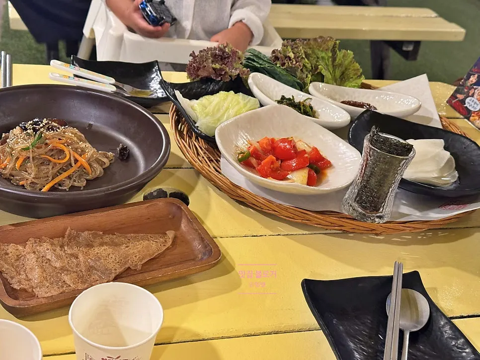 Acorn pancake and gim among the side dishes